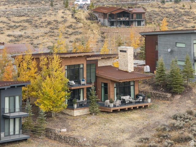 6412 Golden Bear Loop W, Park City, UT 84098 - rear view of house featuring a balcony, a chimney, and a wooden deck