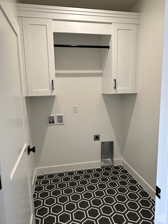 laundry area with hookup for a washing machine and hookup for an electric dryer