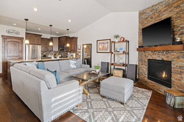 980 W White Cloud Trl, Hideout, UT 84036 - living room featuring a fireplace, wood-type flooring, and vaulted ceiling