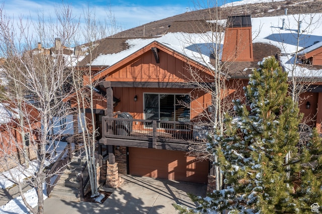 980 W White Cloud Trl, Hideout, UT 84036 - snow covered property featuring a garage