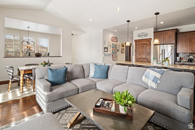 980 W White Cloud Trl, Hideout, UT 84036 - living room featuring a notable chandelier, dark hardwood / wood-style flooring, and lofted ceiling