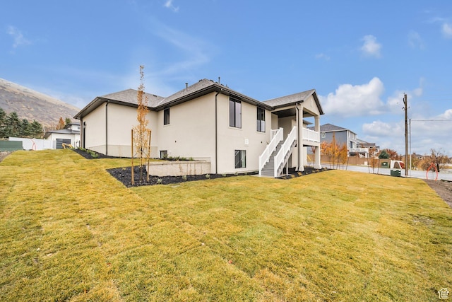 176 S 1150 E, Pleasant Grove, UT 84062 - rear view of property with stairs and stucco siding
