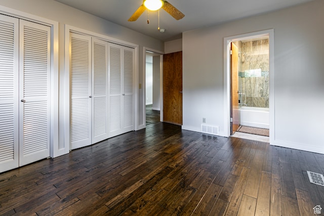1983 E 1700 S, Salt Lake City, UT 84108 - unfurnished bedroom with dark wood-style floors, two closets, baseboards, and ensuite bath
