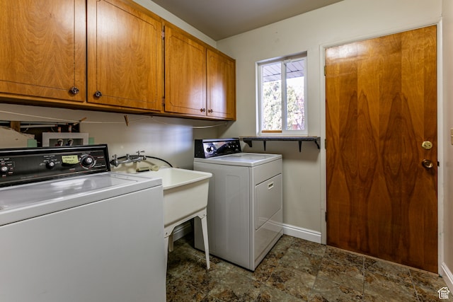 1983 E 1700 S, Salt Lake City, UT 84108 - washroom featuring independent washer and dryer, cabinet space, and baseboards