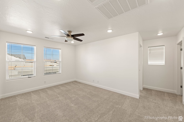 660 W Cypress Umber Dr, St George, UT 84790 - unfurnished room featuring visible vents, baseboards, ceiling fan, recessed lighting, and light carpet