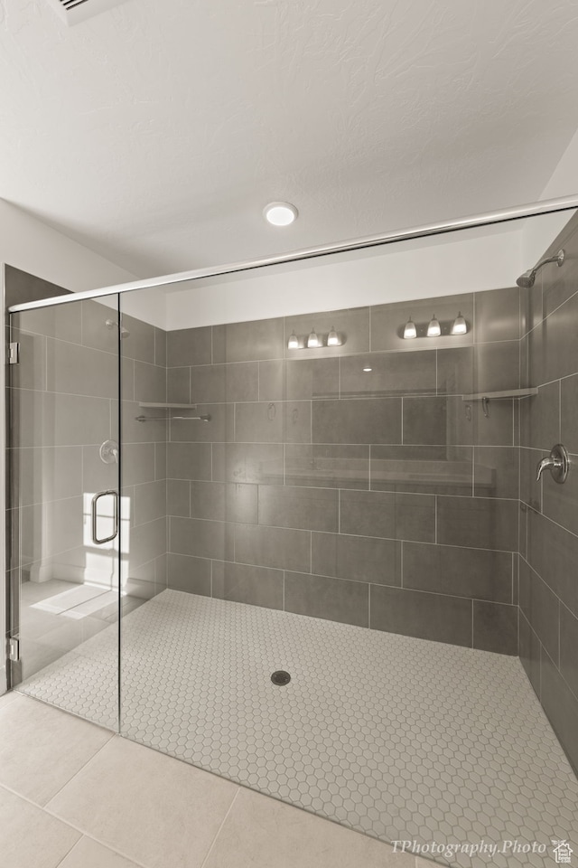 660 W Cypress Umber Dr, St George, UT 84790 - bathroom featuring a stall shower, tile patterned flooring, and recessed lighting