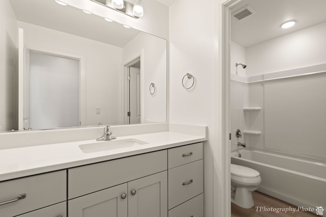 660 W Cypress Umber Dr, St George, UT 84790 - bathroom featuring vanity, shower / tub combination, toilet, visible vents, and wood finished floors