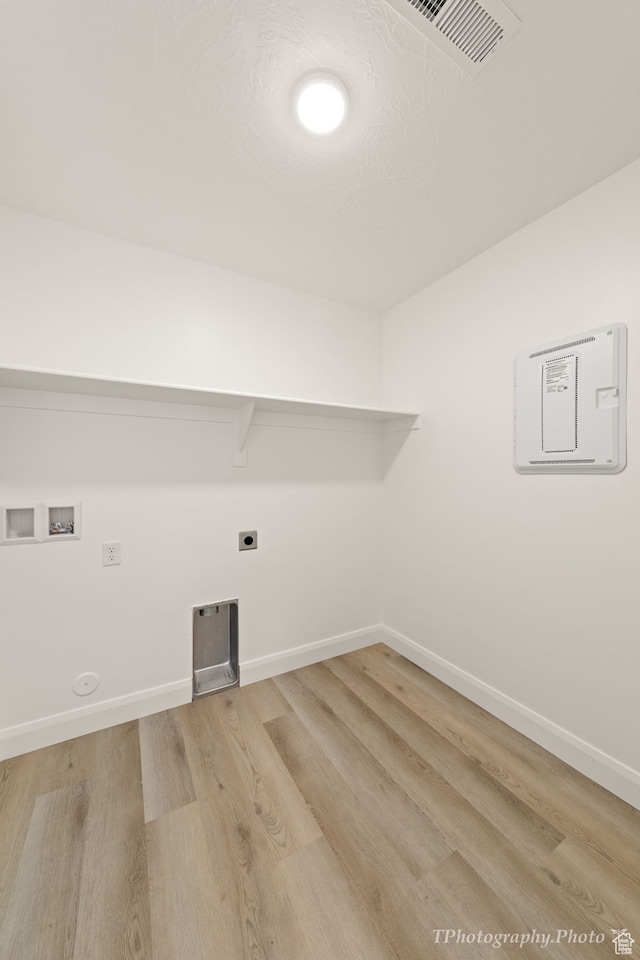 660 W Cypress Umber Dr, St George, UT 84790 - laundry area featuring visible vents, light wood-style floors, laundry area, electric dryer hookup, and hookup for a washing machine