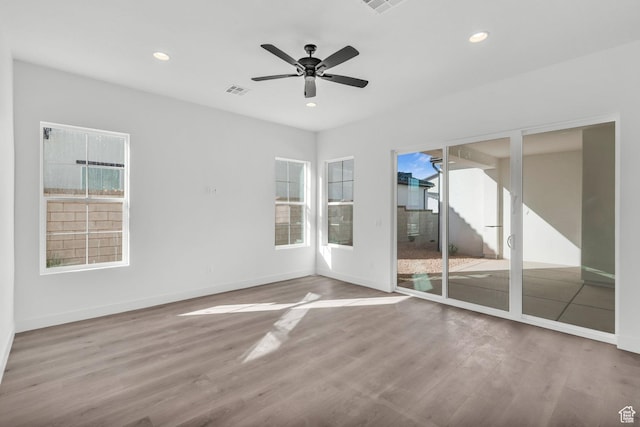 652 W Emerald Point Dr Unit 131, St George, UT 84790 - spare room featuring wood finished floors, baseboards, recessed lighting, and a ceiling fan