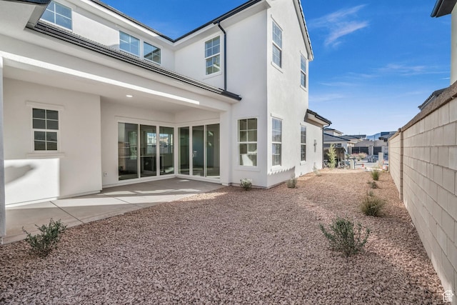 652 W Emerald Point Dr Unit 131, St George, UT 84790 - back of house with stucco siding and a patio area