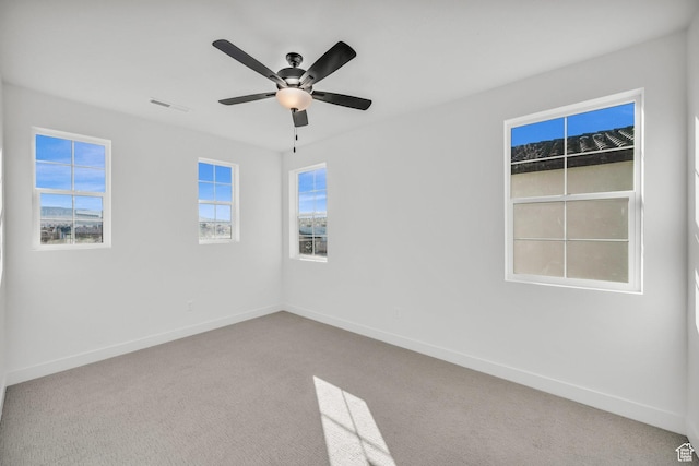 652 W Emerald Point Dr Unit 131, St George, UT 84790 - empty room featuring baseboards, carpet flooring, and a ceiling fan