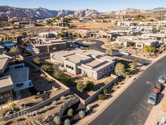 bird's eye view with a residential view and a mountain view