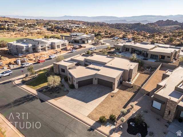 bird's eye view with a residential view and a mountain view