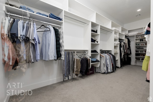 walk in closet with carpet flooring and visible vents