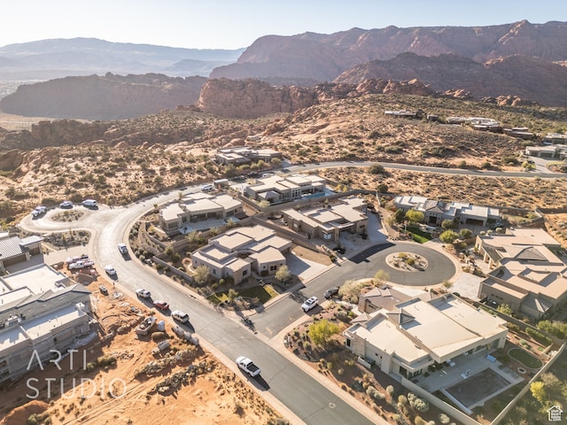 birds eye view of property with a residential view and a mountain view