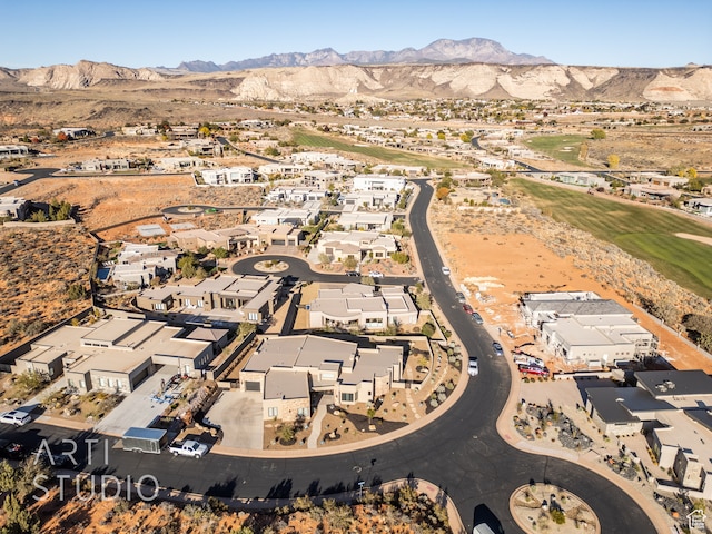 drone / aerial view with a residential view and a mountain view