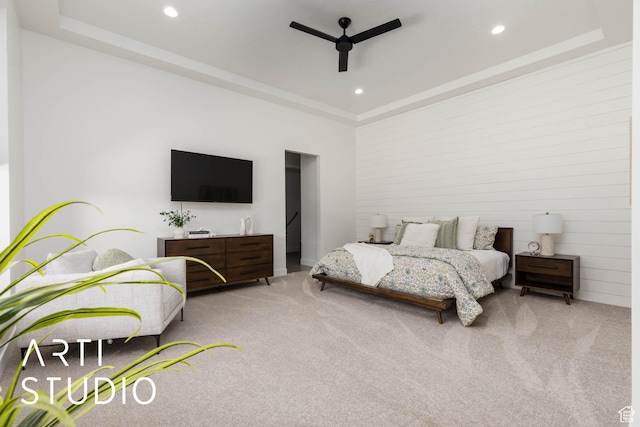 bedroom with a ceiling fan, recessed lighting, and light colored carpet