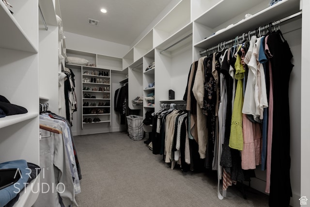 walk in closet with visible vents