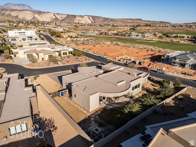 birds eye view of property with a residential view and a mountain view
