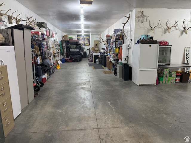 355 S 200 W, Orangeville, UT 84537 - garage with white refrigerator