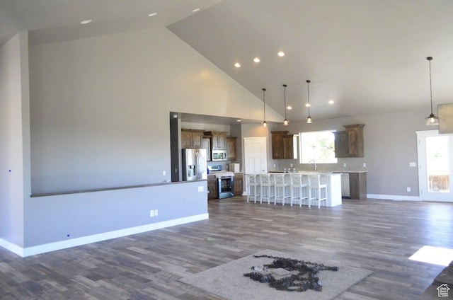 355 S 200 W, Orangeville, UT 84537 - kitchen featuring a large island, plenty of natural light, hanging light fixtures, and appliances with stainless steel finishes