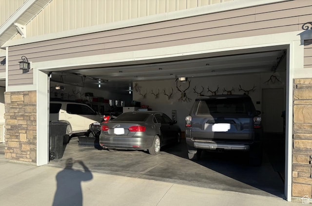 355 S 200 W, Orangeville, UT 84537 - garage featuring a garage door opener