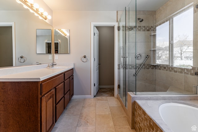 bathroom featuring vanity, tile patterned floors, and independent shower and bath