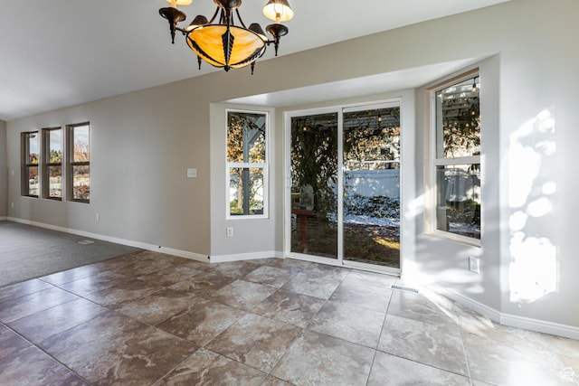 616 W 3200 N, Lehi, UT 84043 - empty room with a chandelier and baseboards