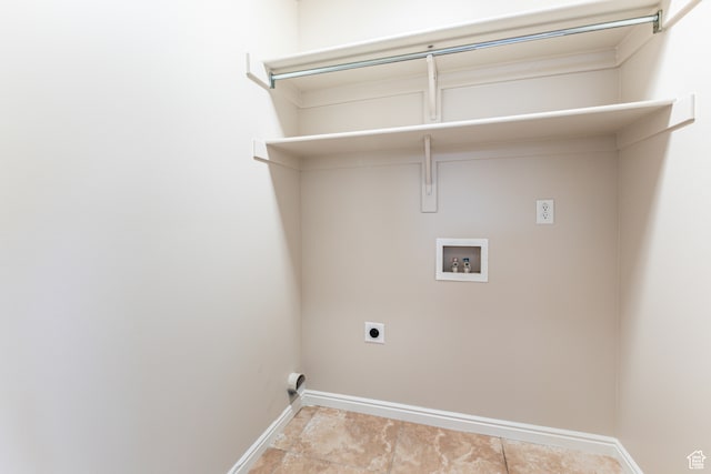 laundry room with hookup for an electric dryer and hookup for a washing machine