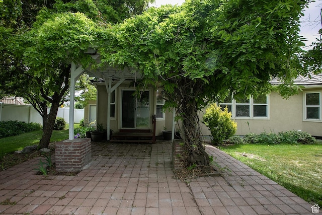 616 W 3200 N, Lehi, UT 84043 - doorway to property featuring stucco siding and a patio area