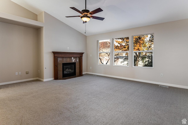 616 W 3200 N, Lehi, UT 84043 - unfurnished living room with lofted ceiling, a ceiling fan, carpet flooring, a tiled fireplace, and baseboards