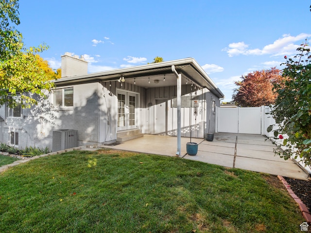 552 E 250 N, Bountiful, UT 84010 - back of house featuring a yard, a patio, and central AC