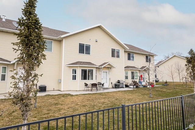 279 W 20 N, Hyrum, UT 84319 - rear view of house with a lawn, a patio area, and central AC