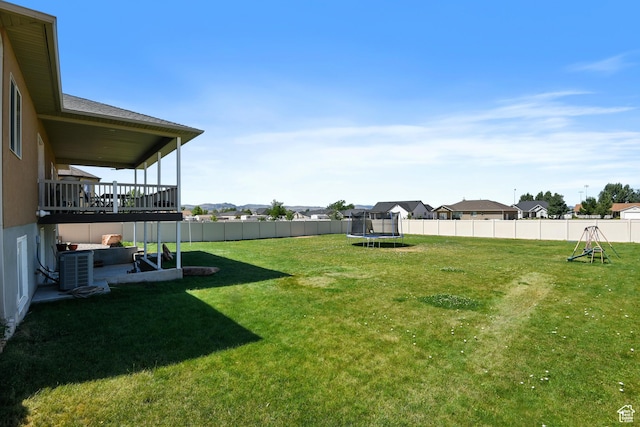 545 N 1100 E, Beaver, UT 84713 - view of yard featuring a trampoline and a residential view