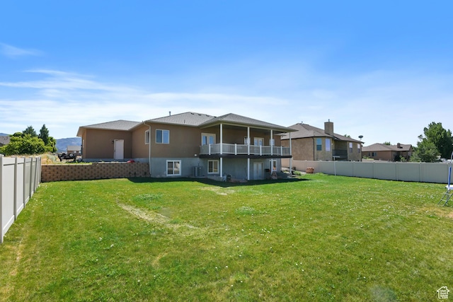 545 N 1100 E, Beaver, UT 84713 - back of house featuring a balcony, stucco siding, and cooling unit