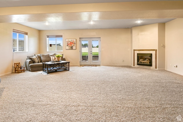 545 N 1100 E, Beaver, UT 84713 - carpeted living area featuring baseboards, a glass covered fireplace, healthy amount of natural light, and recessed lighting