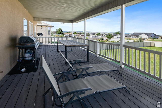 545 N 1100 E, Beaver, UT 84713 - wooden deck featuring a residential view and a lawn