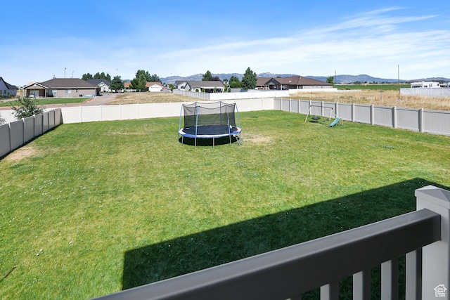 545 N 1100 E, Beaver, UT 84713 - view of yard with a trampoline and a residential view