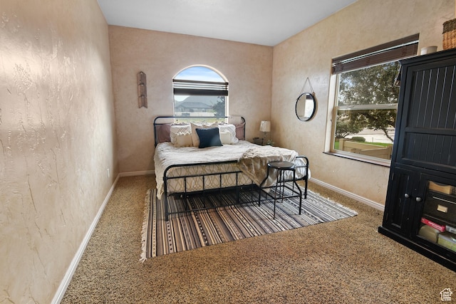 545 N 1100 E, Beaver, UT 84713 - carpeted bedroom with multiple windows and baseboards