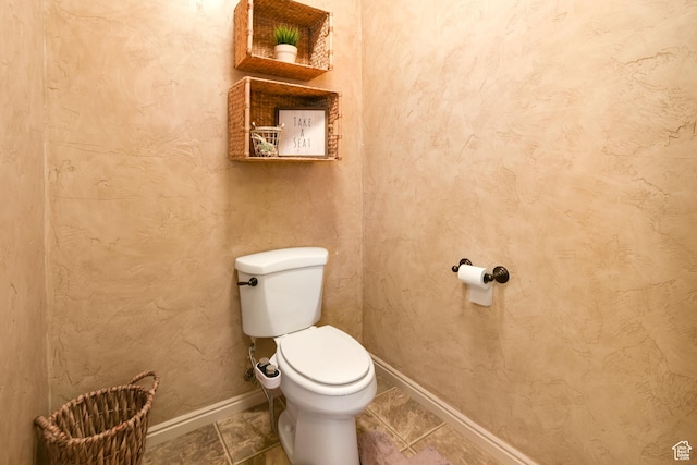 545 N 1100 E, Beaver, UT 84713 - bathroom with toilet, tile patterned floors, and baseboards
