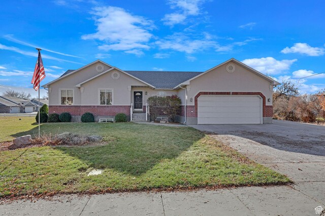 98 W 400 S, Smithfield, UT 84335 - single story home featuring brick siding, driveway, an attached garage, and a front lawn