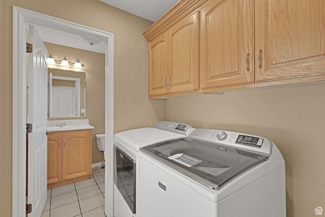 98 W 400 S, Smithfield, UT 84335 - laundry area with washer and clothes dryer, cabinet space, and light tile patterned floors