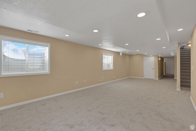 98 W 400 S, Smithfield, UT 84335 - below grade area featuring light carpet, recessed lighting, stairway, baseboards, and a textured ceiling