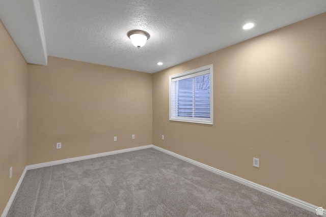 98 W 400 S, Smithfield, UT 84335 - unfurnished room featuring a textured ceiling, carpet flooring, baseboards, and recessed lighting