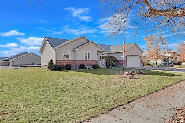98 W 400 S, Smithfield, UT 84335 - view of front facade with brick siding, stucco siding, driveway, and a garage