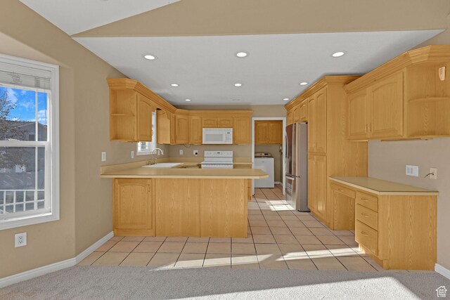 98 W 400 S, Smithfield, UT 84335 - kitchen featuring white appliances, washer / clothes dryer, open shelves, a peninsula, and light countertops