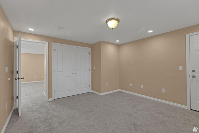 98 W 400 S, Smithfield, UT 84335 - unfurnished bedroom with carpet, recessed lighting, baseboards, and a closet