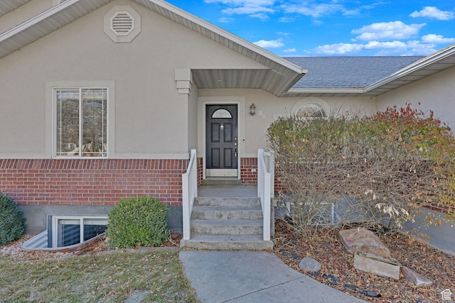 98 W 400 S, Smithfield, UT 84335 - property entrance with brick siding, stucco siding, and a shingled roof
