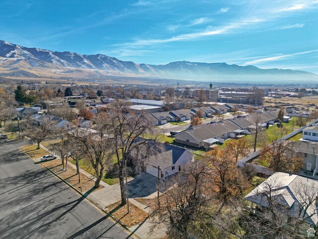 98 W 400 S, Smithfield, UT 84335 - aerial overview of property's location featuring a mountain backdrop and nearby suburban area