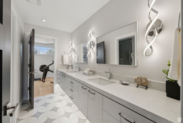 bathroom featuring hardwood / wood-style floors and vanity